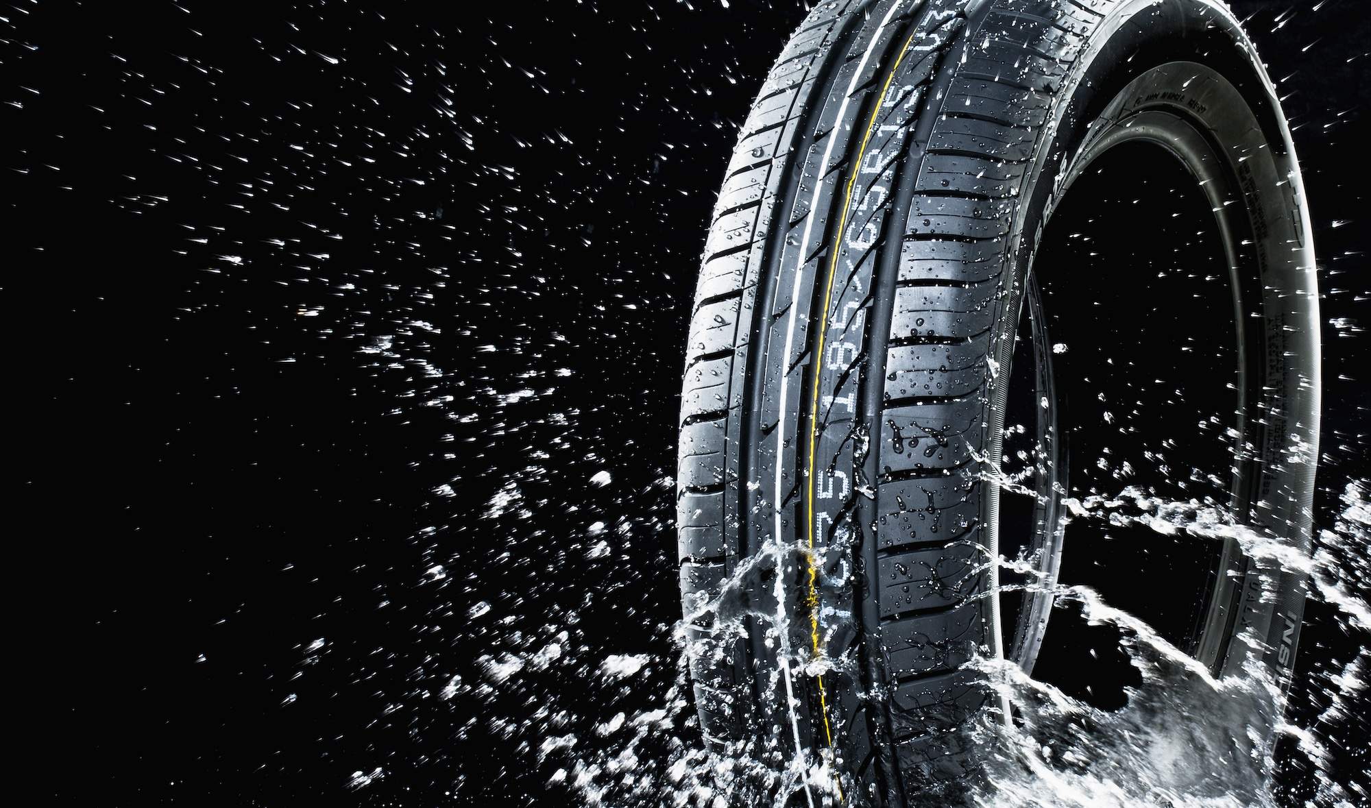 Car tyre in wetness